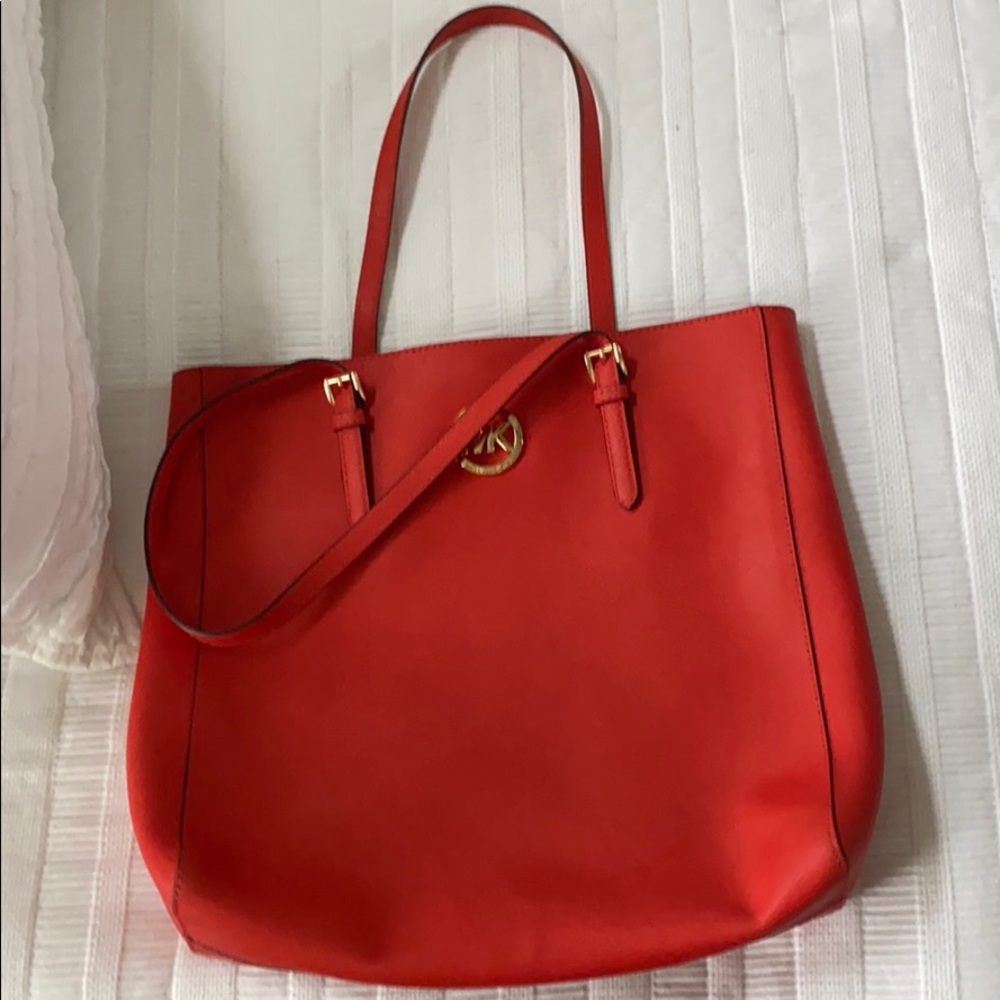 {Michael Kors} Orange tote bag.